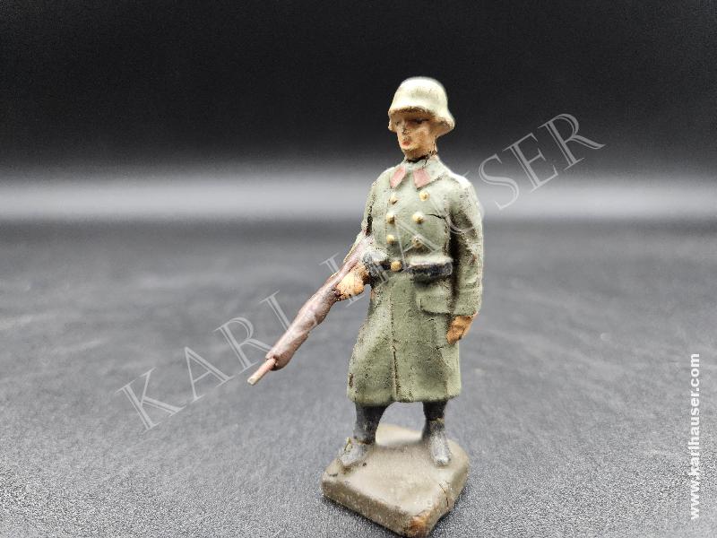 Art.  elastolin-heer-soldat-im-mantel-auf-wache-stehend