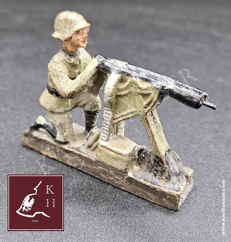 Art.  leyla-german-toy-soldier-firing-with-machine-gun